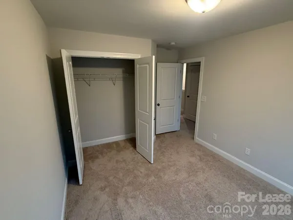 an empty room with closet