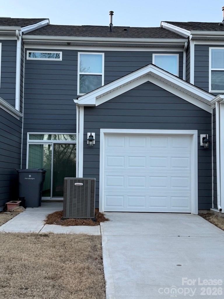 5593 Stafford Road Charlotte, NC 28215 - Photo 21 of 23 a front view of a house with a garage