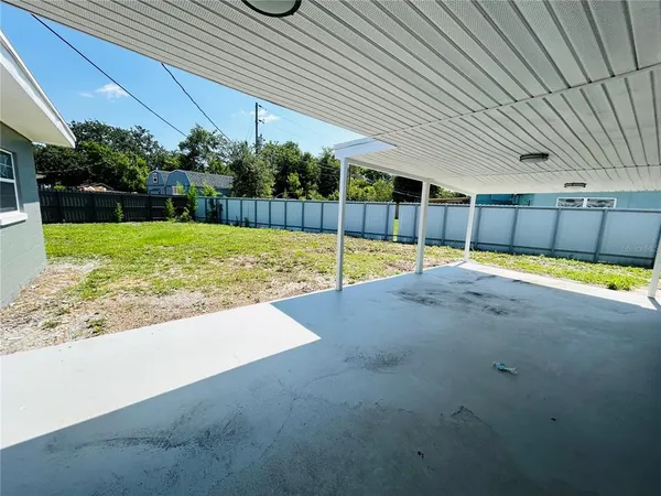 a view of a backyard with a slide
