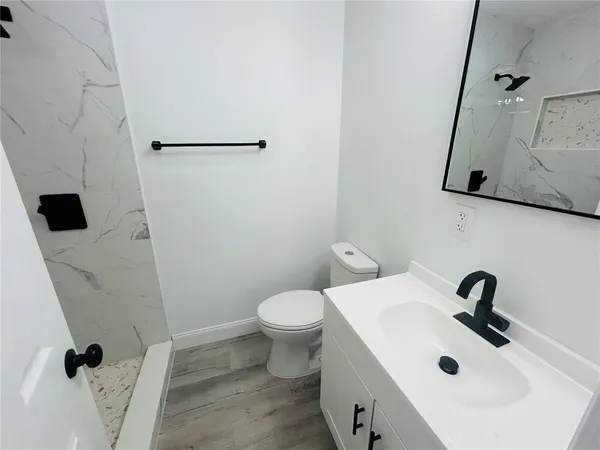 a bathroom with a sink and mirror