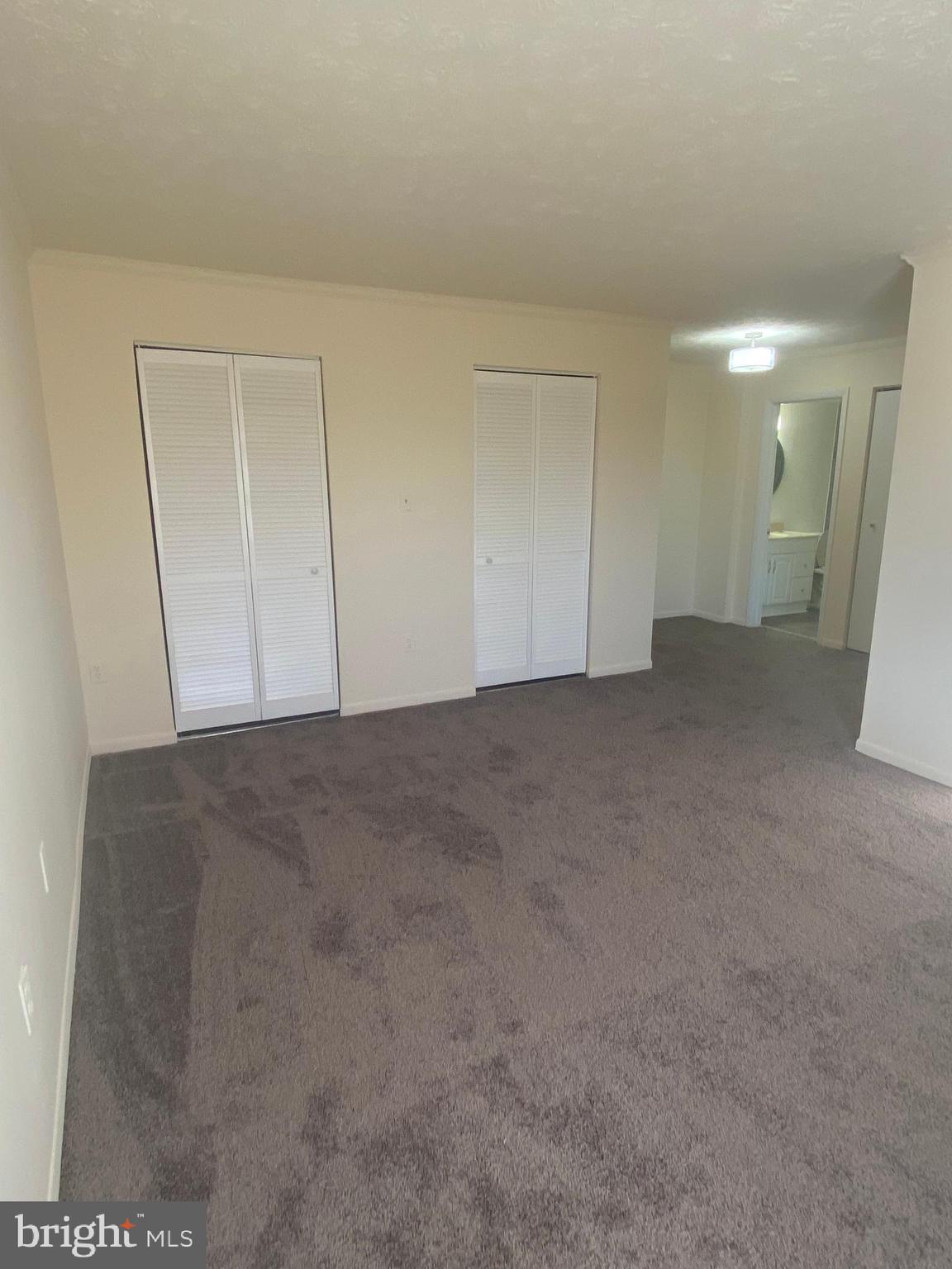 8009 Mandan Road, Unit 303 Greenbelt, MD 20770 - Photo 11 of 19 Master Bedroom