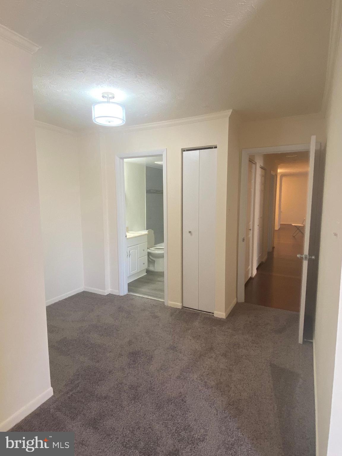 8009 Mandan Road, Unit 303 Greenbelt, MD 20770 - Photo 12 of 19 Master Bedroom