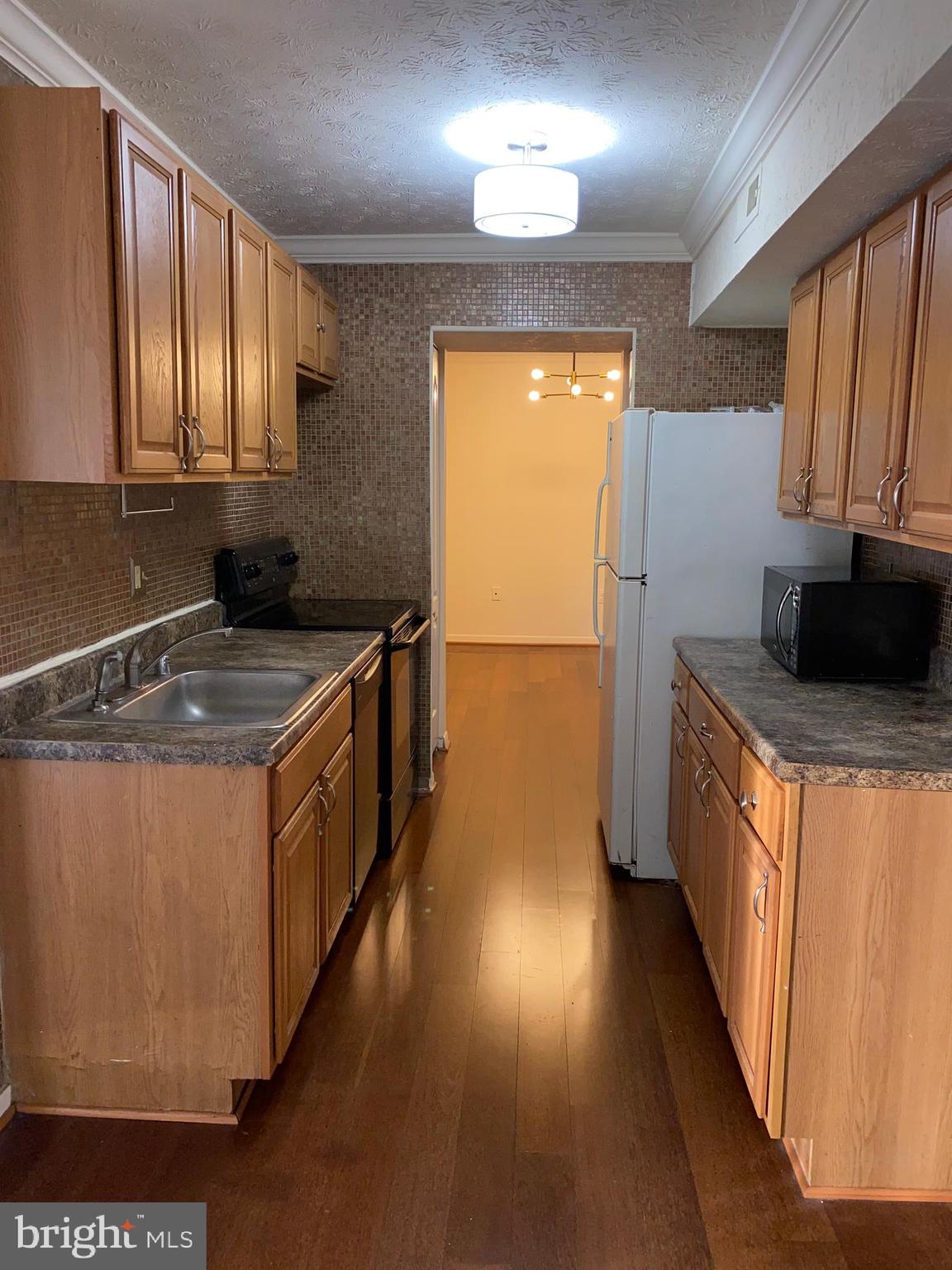 8009 Mandan Road, Unit 303 Greenbelt, MD 20770 - Photo 6 of 19 Kitchen