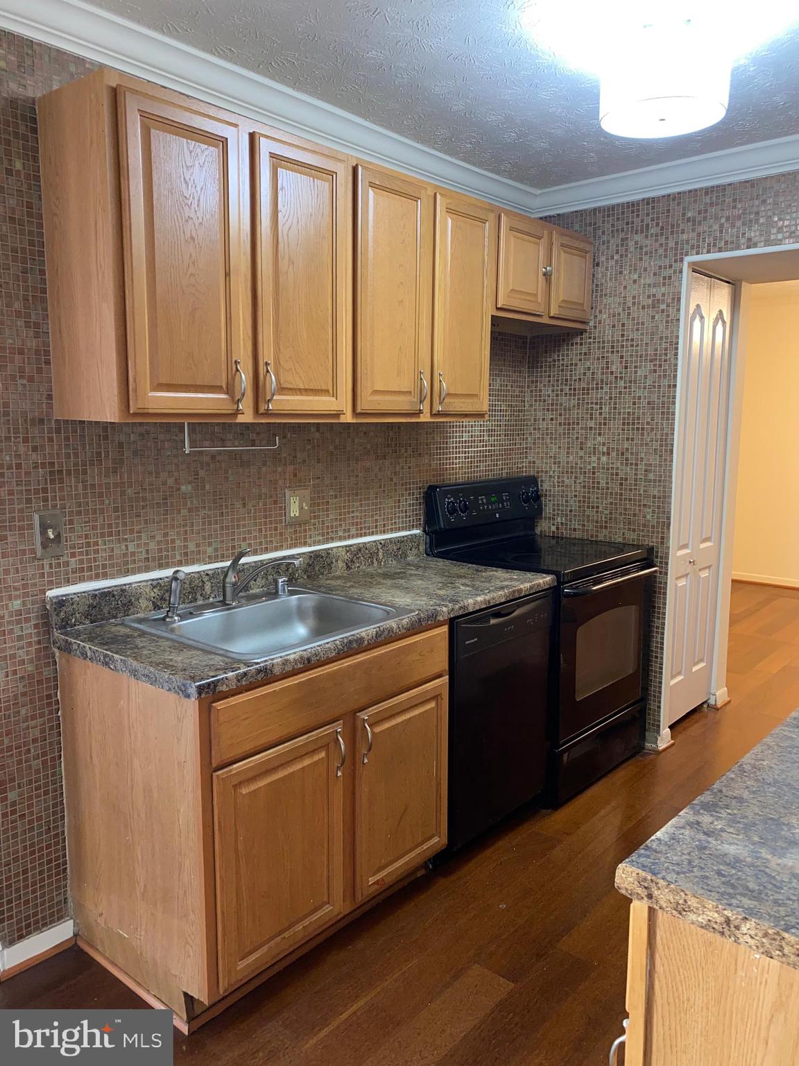8009 Mandan Road, Unit 303 Greenbelt, MD 20770 - Photo 7 of 19 Kitchen