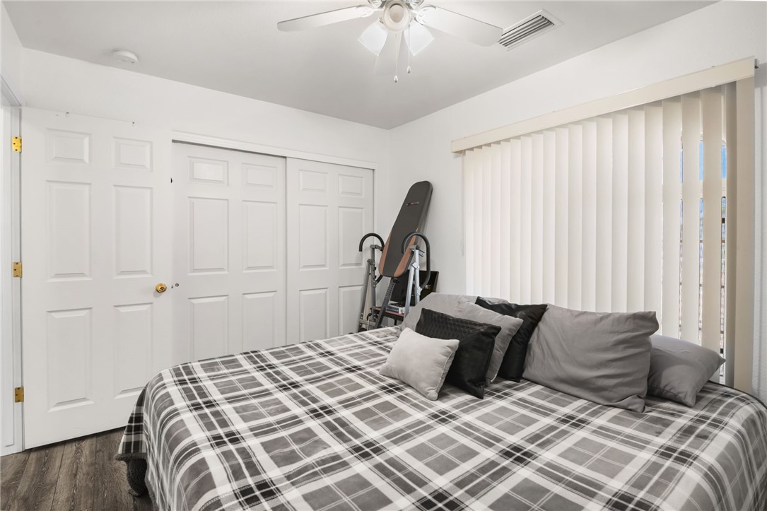 3668 North Neptune Road Golden Valley, AZ 86413 - Photo 29 of 38 This room features a ceiling fan, vertical blinds, and white paneled doors
