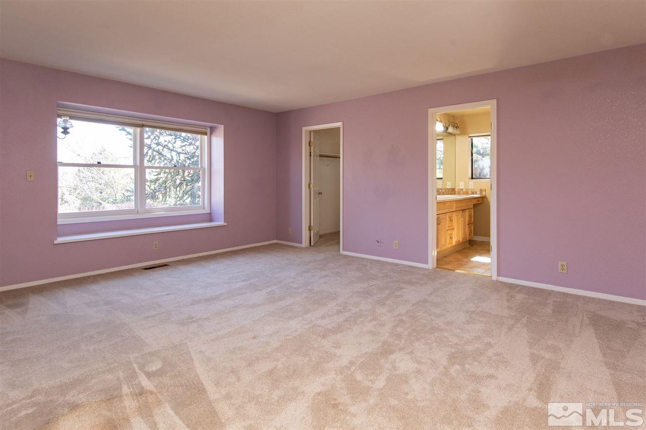 13100 Fellowship Way Reno, NV 89511 - Photo 18 of 40 an empty room with windows and closet