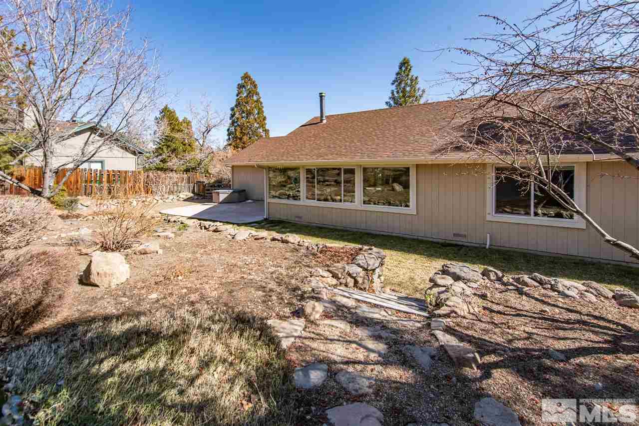 13100 Fellowship Way Reno, NV 89511 - Photo 28 of 40 a view of a house with a yard