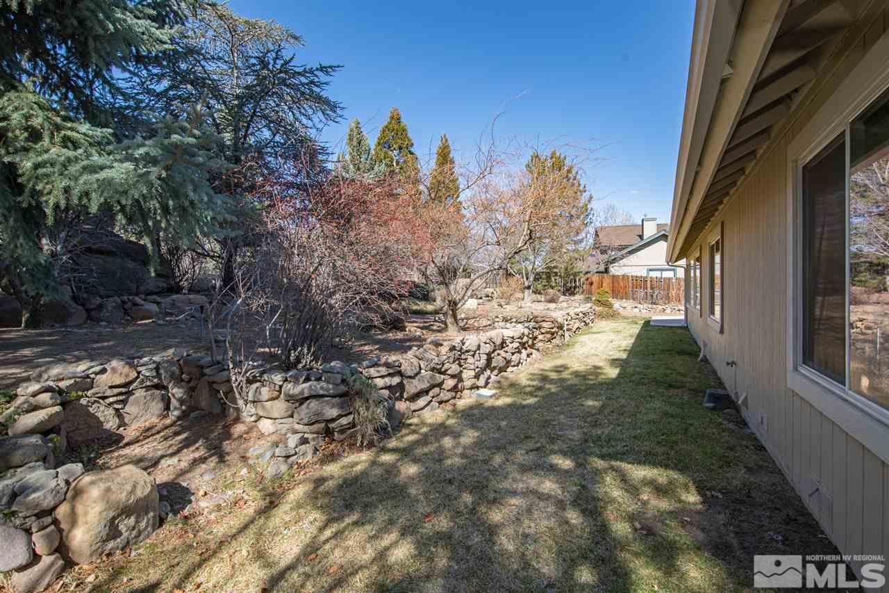 13100 Fellowship Way Reno, NV 89511 - Photo 29 of 40 a view of a yard with a tree