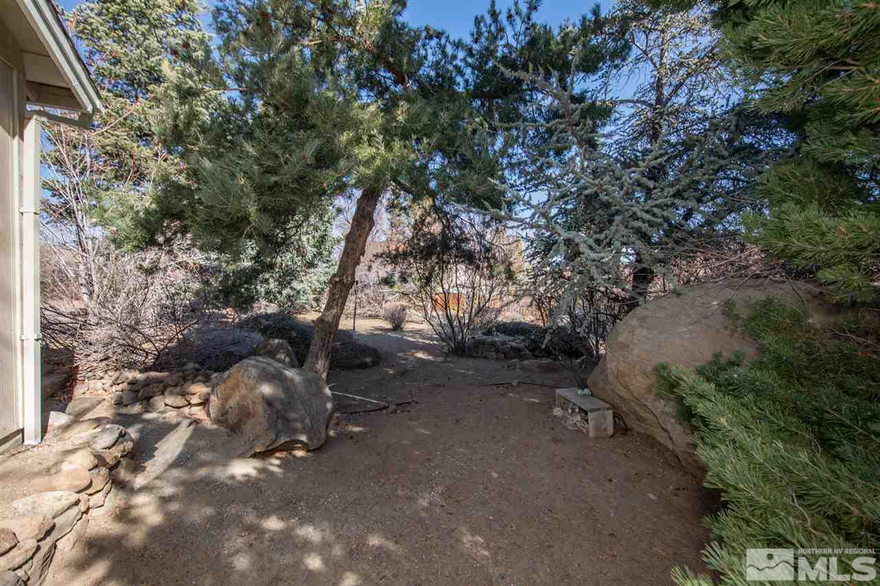 13100 Fellowship Way Reno, NV 89511 - Photo 31 of 40 a backyard of a house with lots of green space