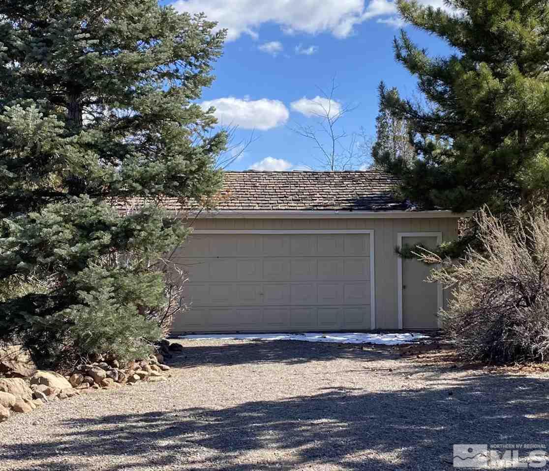 13100 Fellowship Way Reno, NV 89511 - Photo 32 of 40 a view of a house with a yard
