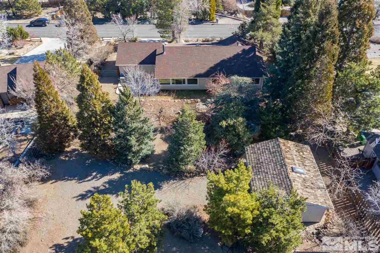 13100 Fellowship Way Reno, NV 89511 - Photo 37 of 40 an aerial view of a house with a yard and lake view