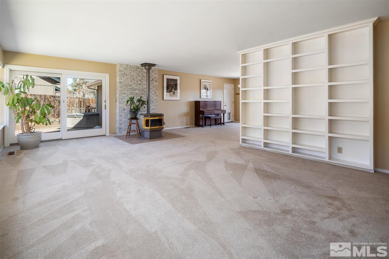 13100 Fellowship Way Reno, NV 89511 - Photo 5 of 40 a view of a livingroom with furniture and a large window