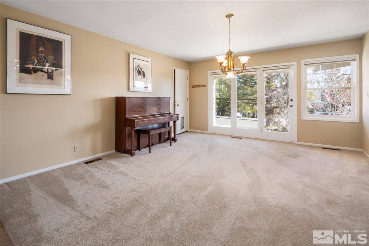 13100 Fellowship Way Reno, NV 89511 - Photo 6 of 40 a view of a livingroom with furniture window and outside view