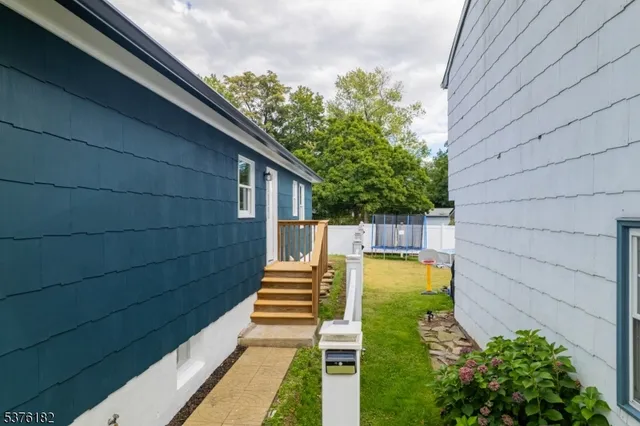 a view of house with patio outdoor seating