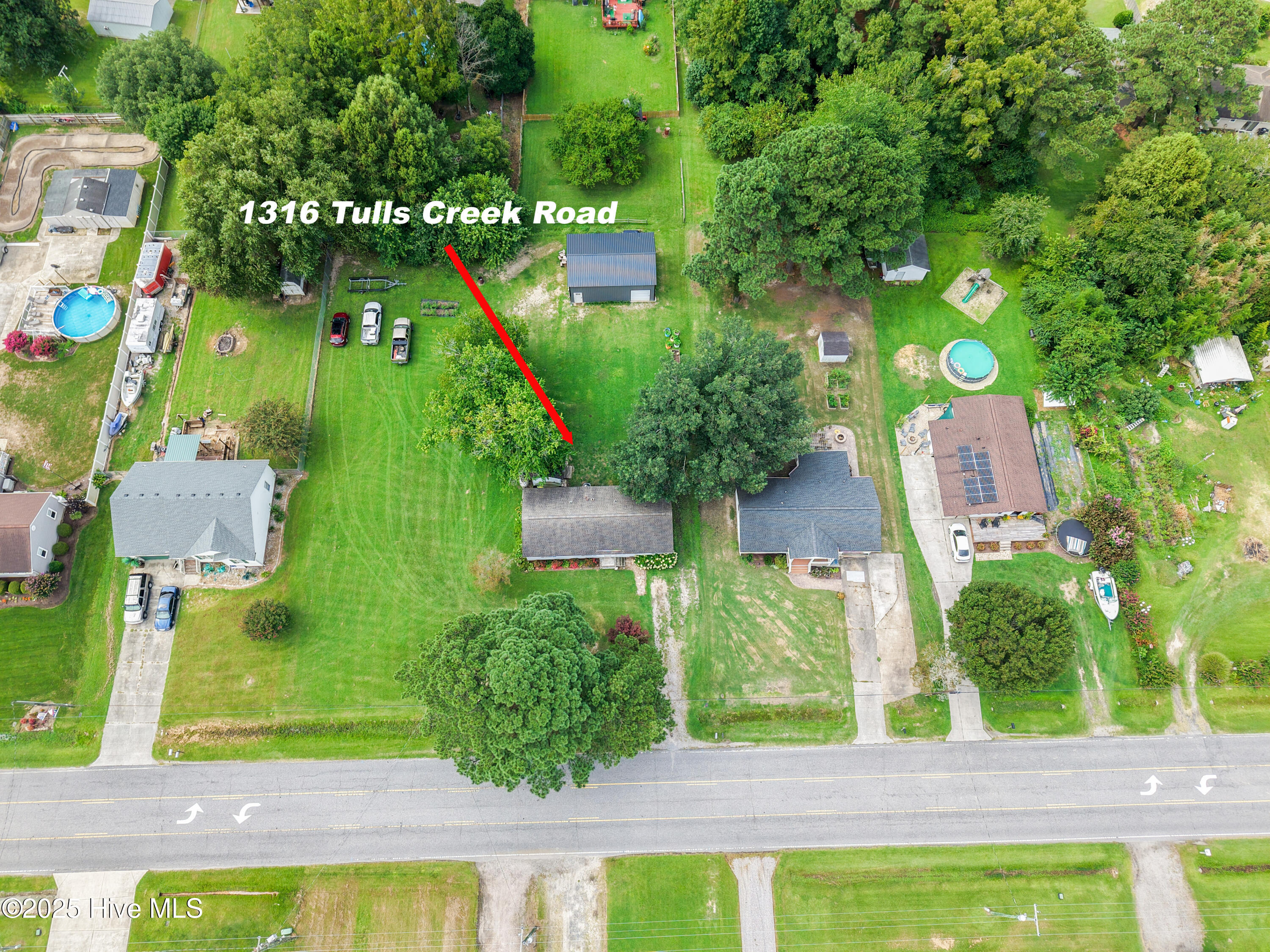 1316 Tulls Creek Road Moyock, NC 27958 - Photo 3 of 44 DJI_20250818111909_0816_Dedit