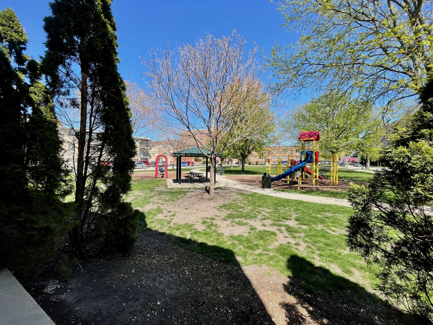 1258 Brown Street, Unit 302 Des Plaines, IL 60016 - Photo 17 of 17 a view of yard with swimming pool and green space