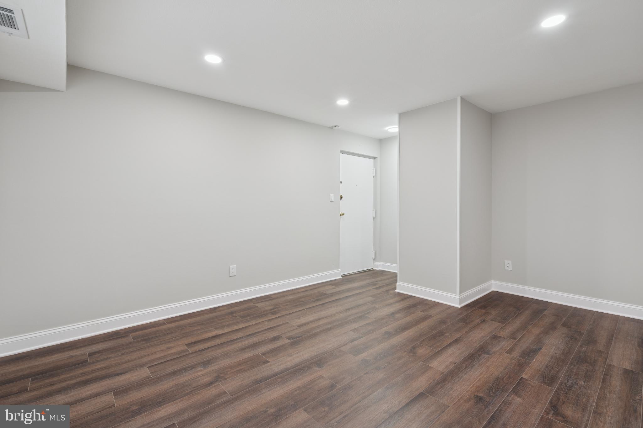 11909 Tarragon Road, Unit D Reisterstown, MD 21136 - Photo 4 of 14 Spacious, modern interior with warm tones.