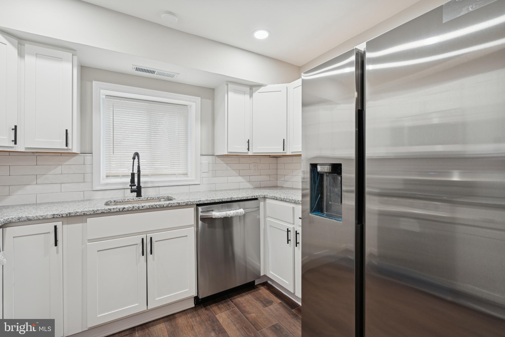 11909 Tarragon Road, Unit D Reisterstown, MD 21136 - Photo 5 of 14 Modern kitchen with sleek stainless steel appli...