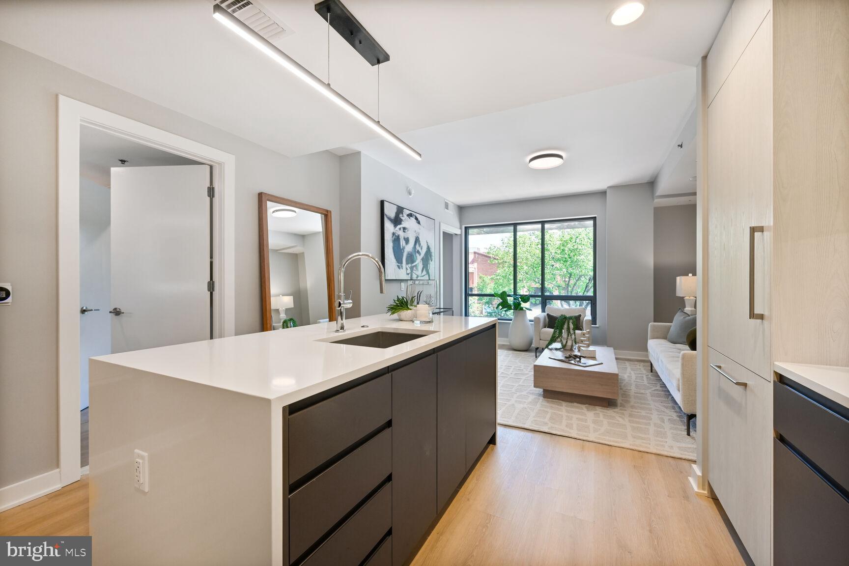 950 3rd Street Northwest, Unit 402 Washington, DC 20001 - Photo 22 of 37 a large white room with a large window