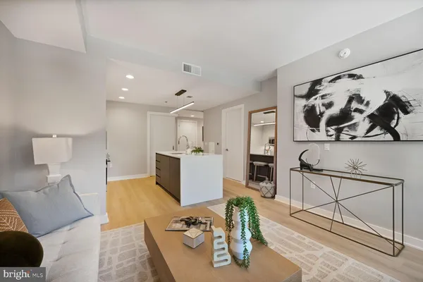 a bedroom with a bed and a lamp