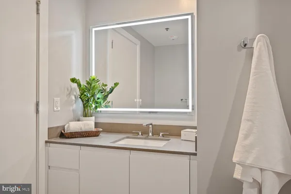 a view of storage and utility room with washer and dryer