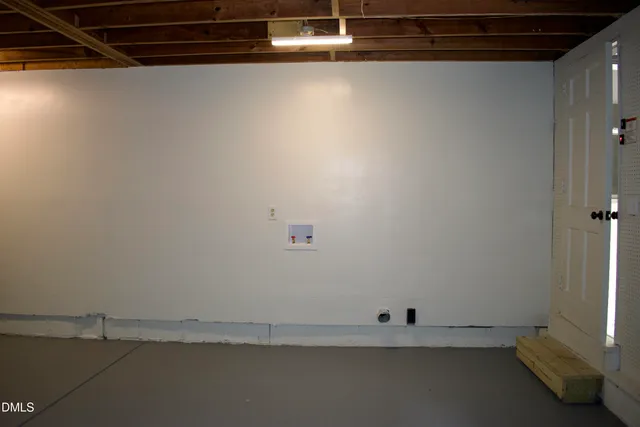 a view of a room with an empty space