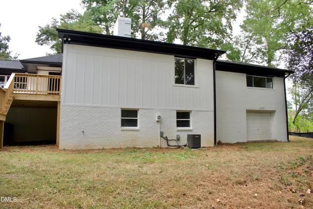 a house with trees in the background
