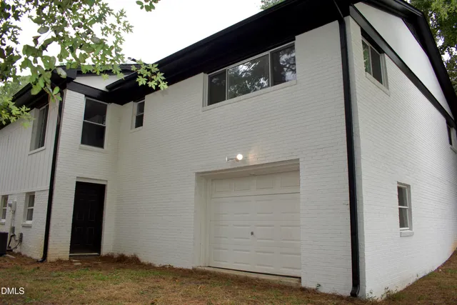 a view of a house with a garage