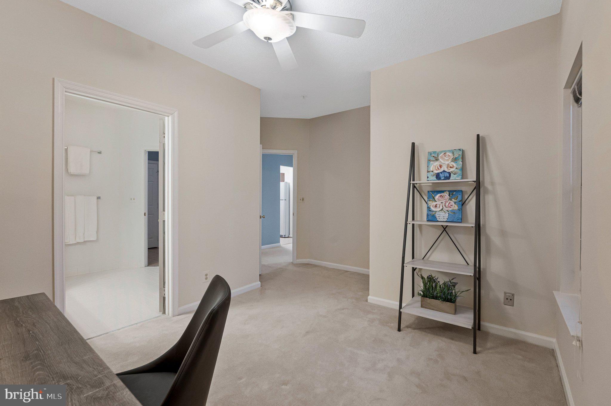 1720 Lake Shore Crest Drive, Unit 26 Reston, VA 20190 - Photo 18 of 38 a view of a hallway with workspace