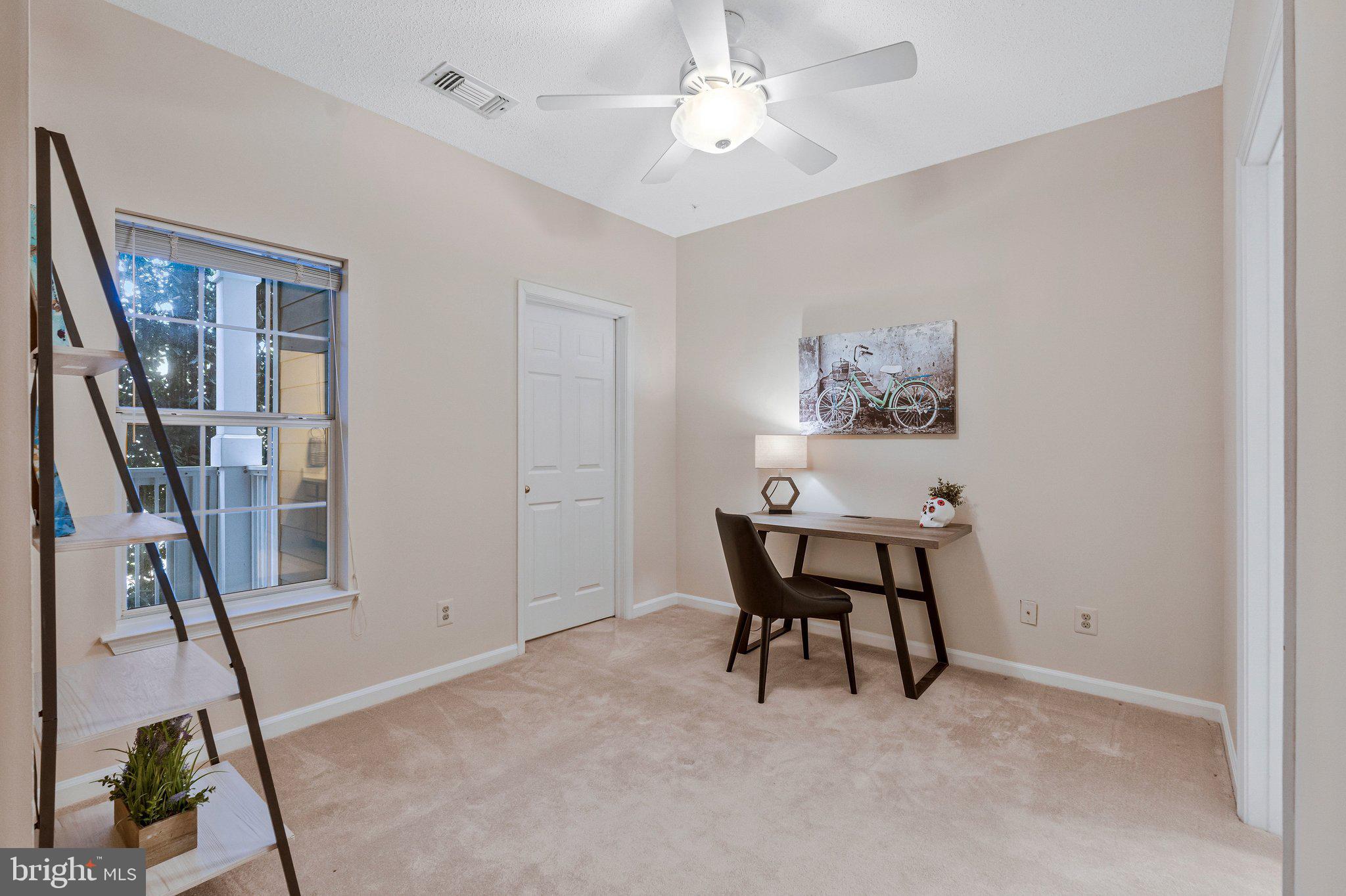 1720 Lake Shore Crest Drive, Unit 26 Reston, VA 20190 - Photo 19 of 38 a workspace with furniture and entryway