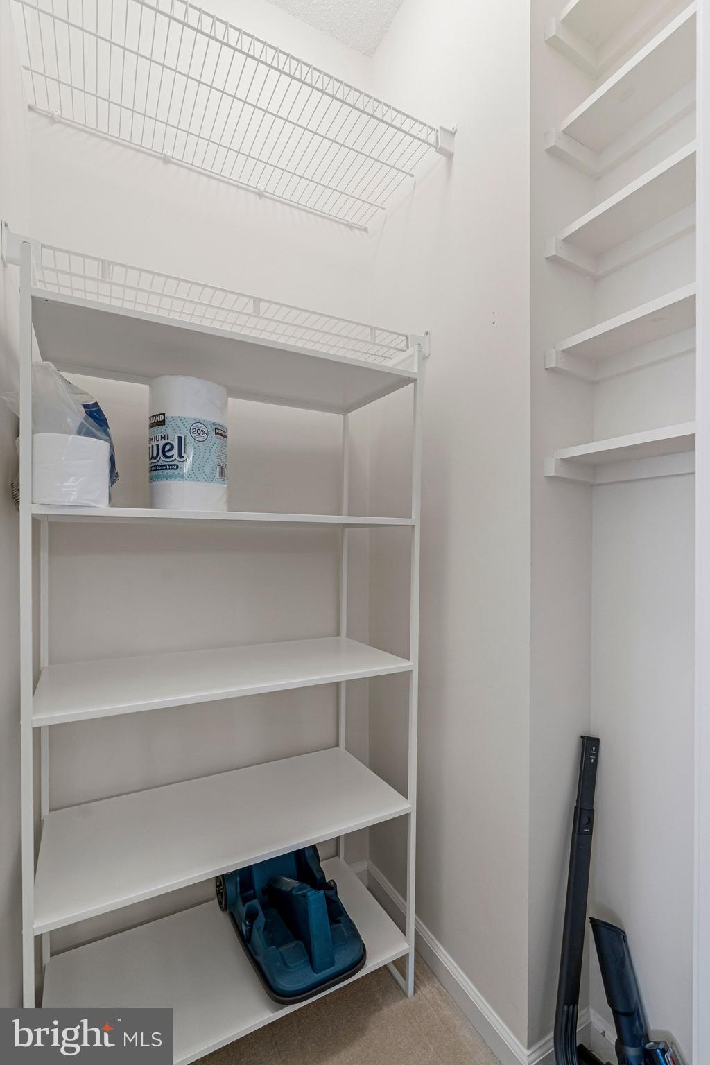 1720 Lake Shore Crest Drive, Unit 26 Reston, VA 20190 - Photo 24 of 38 a view of storage and utility room with empty racks