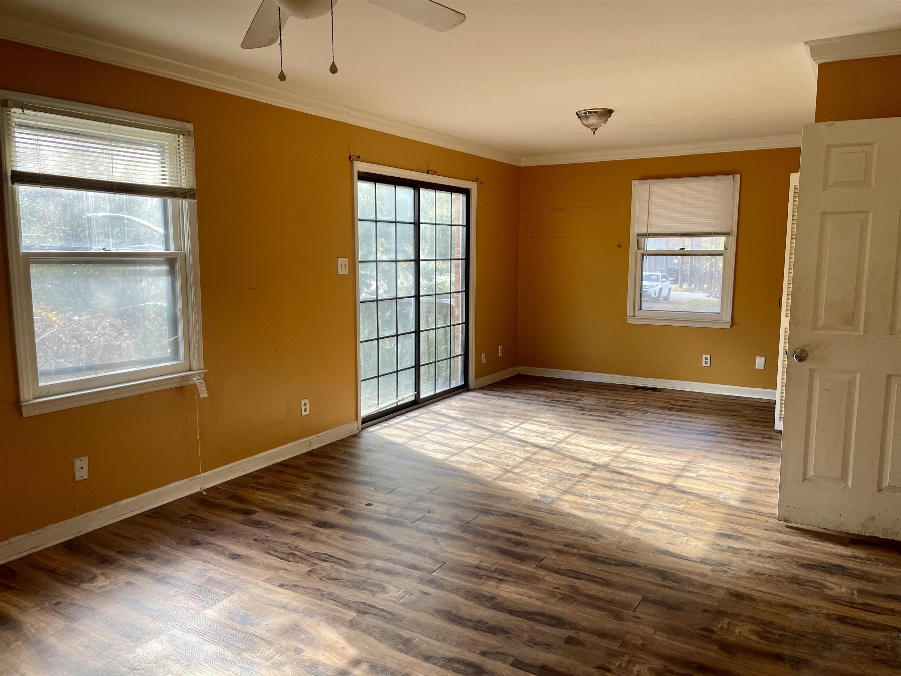 5017 Robinwood Road Durham, NC 27713 - Photo 11 of 31 an empty room with windows