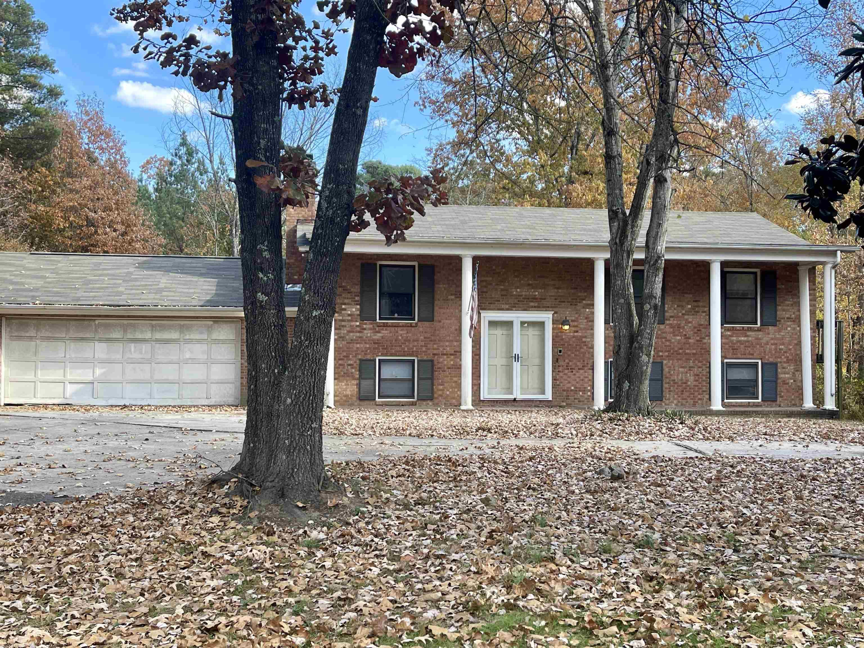 5017 Robinwood Road Durham, NC 27713 - Photo 2 of 31 a front view of a house with a tree