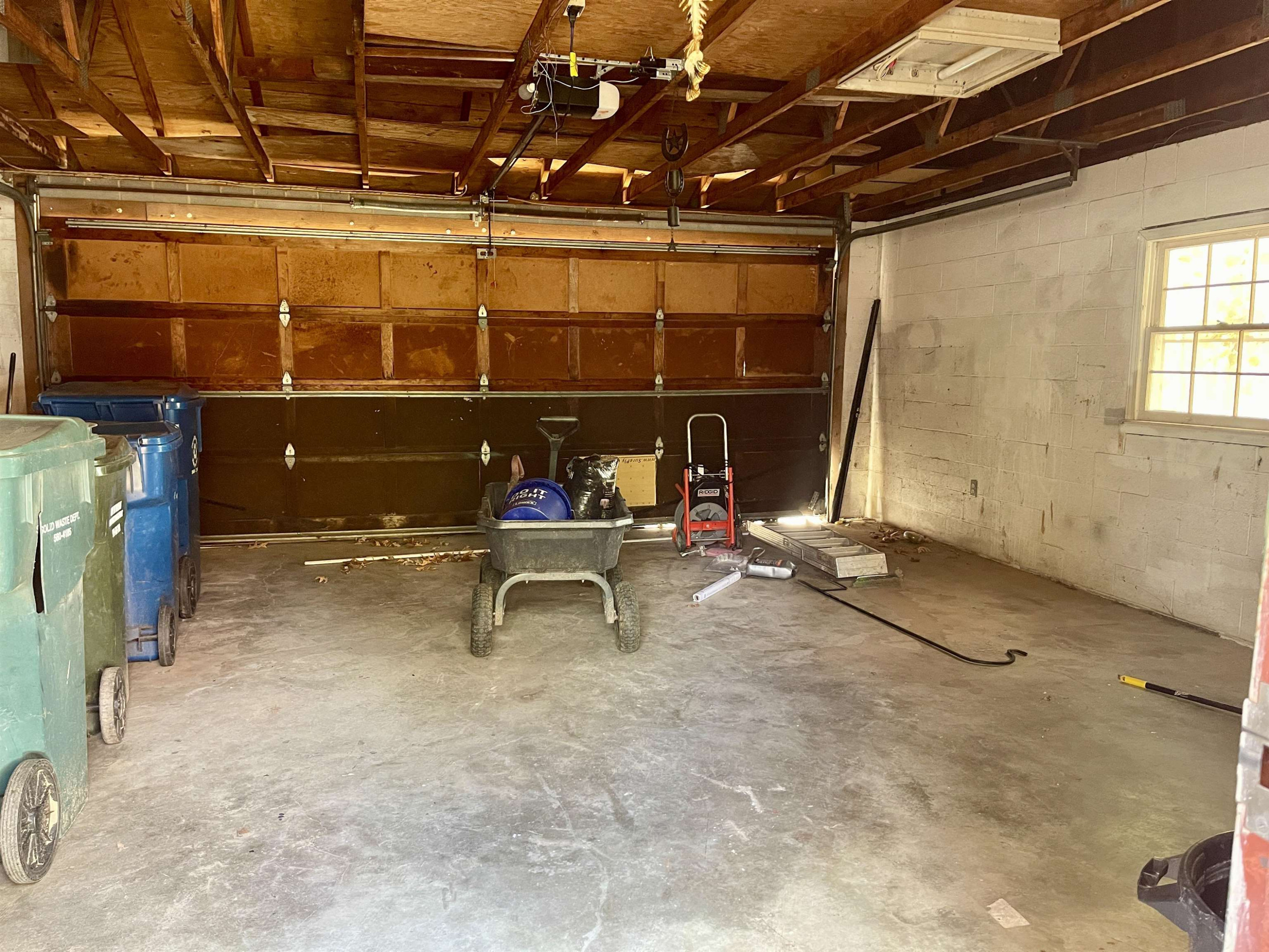 5017 Robinwood Road Durham, NC 27713 - Photo 22 of 31 a room with gym equipment