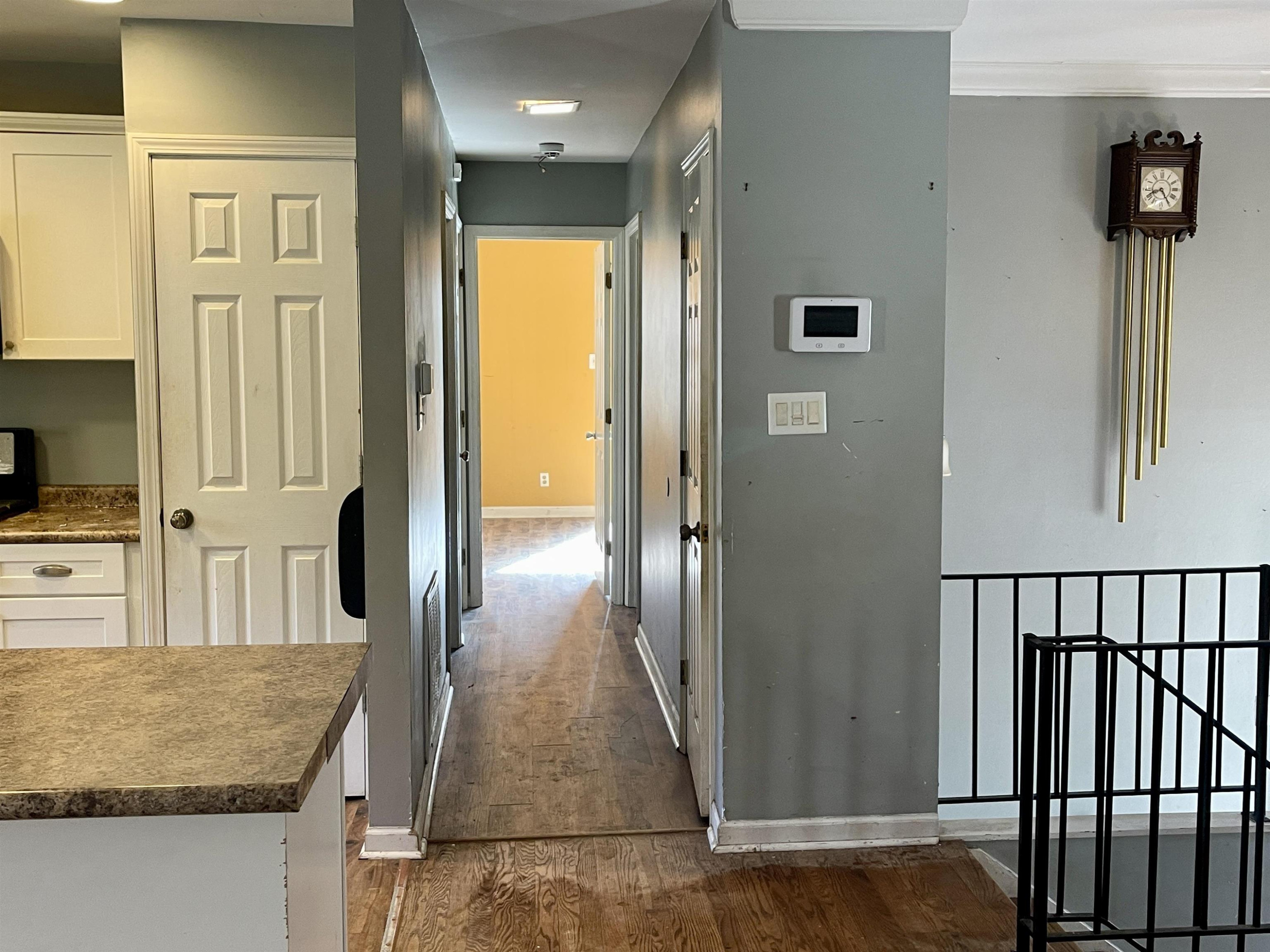 5017 Robinwood Road Durham, NC 27713 - Photo 8 of 31 a view of a kitchen from the hallway