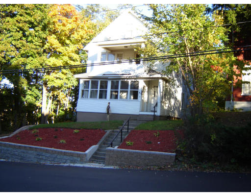61-63 Myrtle Street Springfield, MA 01151 - Photo 1 of 1 a view of house with a yard