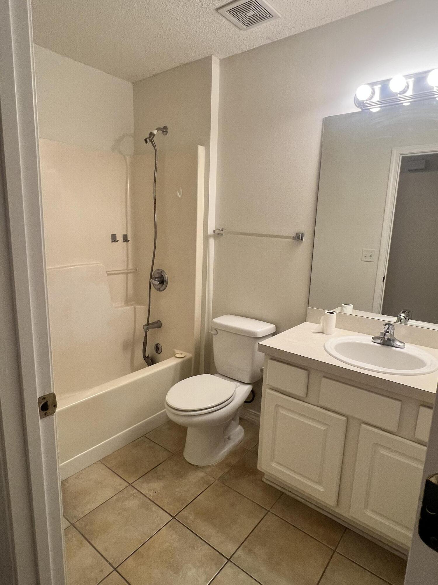 8 Howard Street Niceville, FL 32578 - Photo 18 of 22 a bathroom with a sink toilet and shower