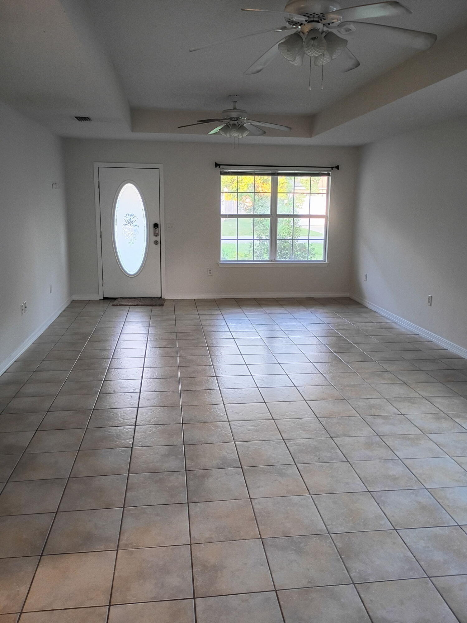 8 Howard Street Niceville, FL 32578 - Photo 3 of 22 a view of an empty room with a window