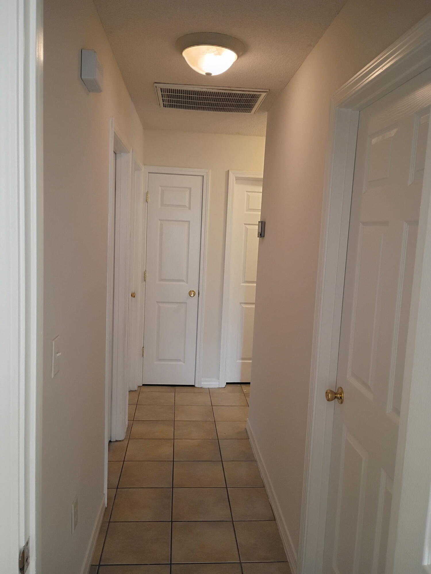 8 Howard Street Niceville, FL 32578 - Photo 7 of 22 a view of hallway with window