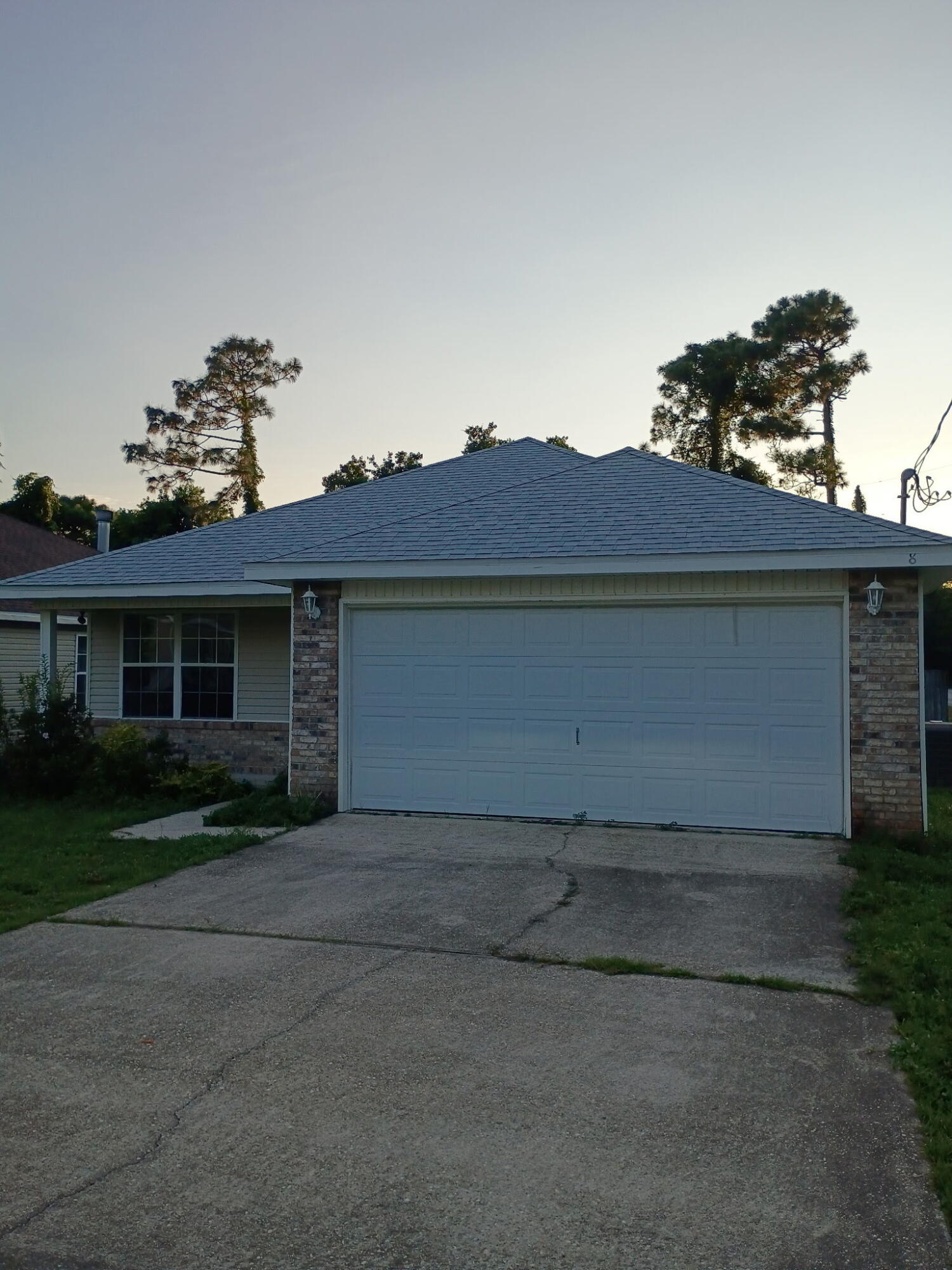 8 Howard Street Niceville, FL 32578 - Photo 9 of 22 a view of a house with a yard