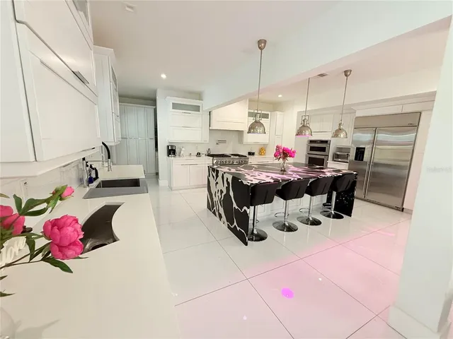 a bedroom with a bed and lamp