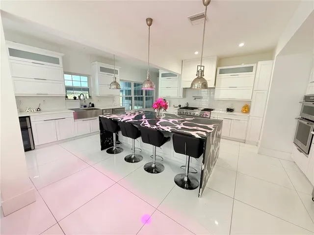 a view of a livingroom with furniture window and outside view