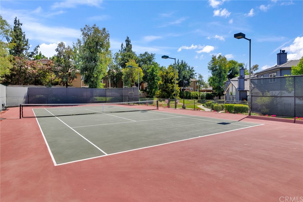 1555 Orange Avenue, Unit 401 Redlands, CA 92373 - Photo 21 of 21 a view of a tennis court