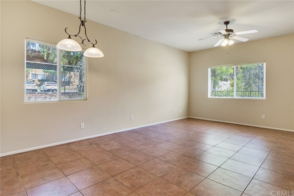 1555 Orange Avenue, Unit 401 Redlands, CA 92373 - Photo 7 of 21 a view of an empty room with a window