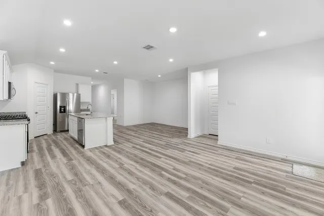 a view of kitchen with wooden floor