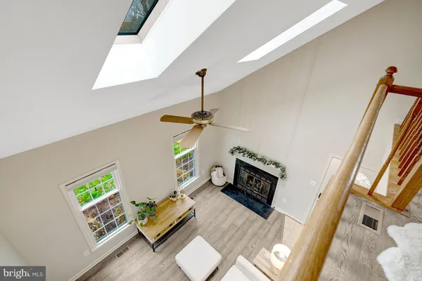a view of staircase with white walls