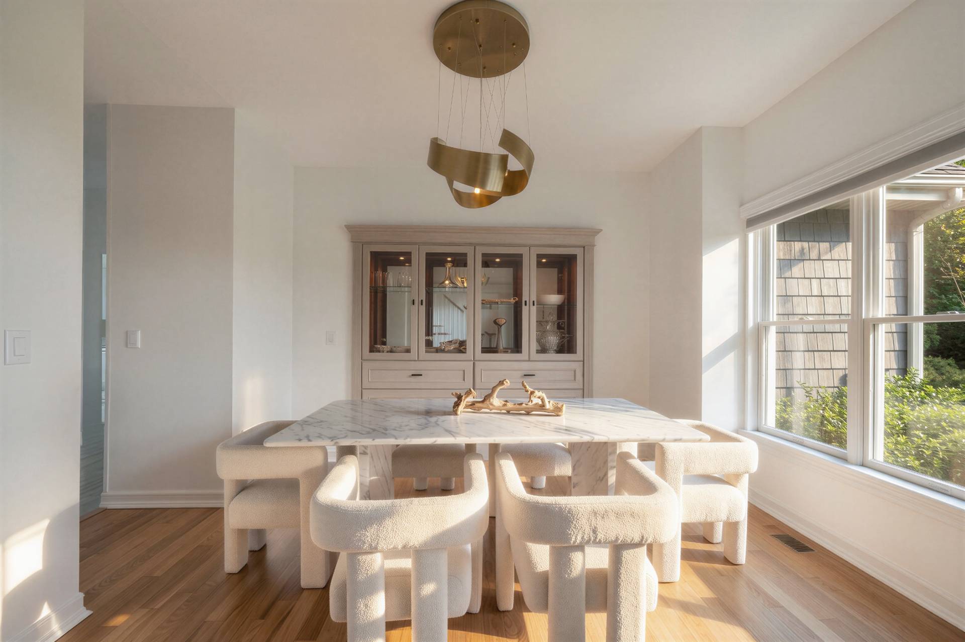 Undisclosed Address Remsenburg, NY 11960 - Photo 24 of 39 a view of a dining room with furniture wooden floor and chandelier