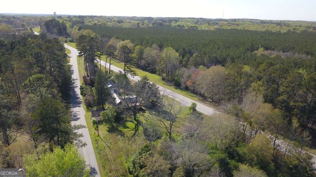 13162 Augusta Highway Sparta, GA 31087 - Photo 26 of 28 a view of a lake with a mountain in the background