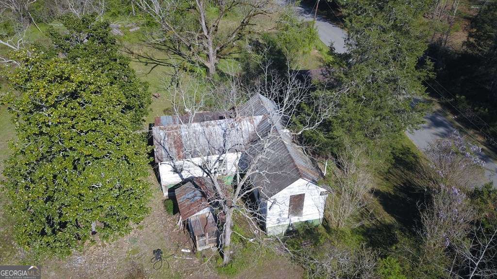 13162 Augusta Highway Sparta, GA 31087 - Photo 4 of 28 a backyard of a house with lots of green space