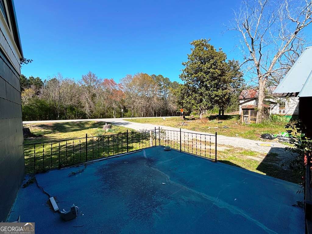 13162 Augusta Highway Sparta, GA 31087 - Photo 8 of 28 a view of an outdoor space and deck
